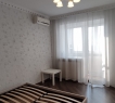 Комнаты раздельные площадью 15 кв.м и 12 кв.м, кухня 13 кв.м. Лоджия из спальни, застеклена.