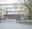 Дом находится на пересечении улиц Поперечно-Базарная, Дежнева и Дружинная.